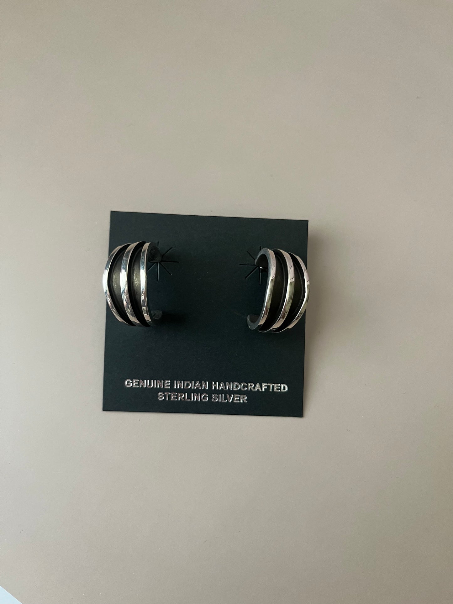 Hoop Earrings by Tom Hawk Stamped