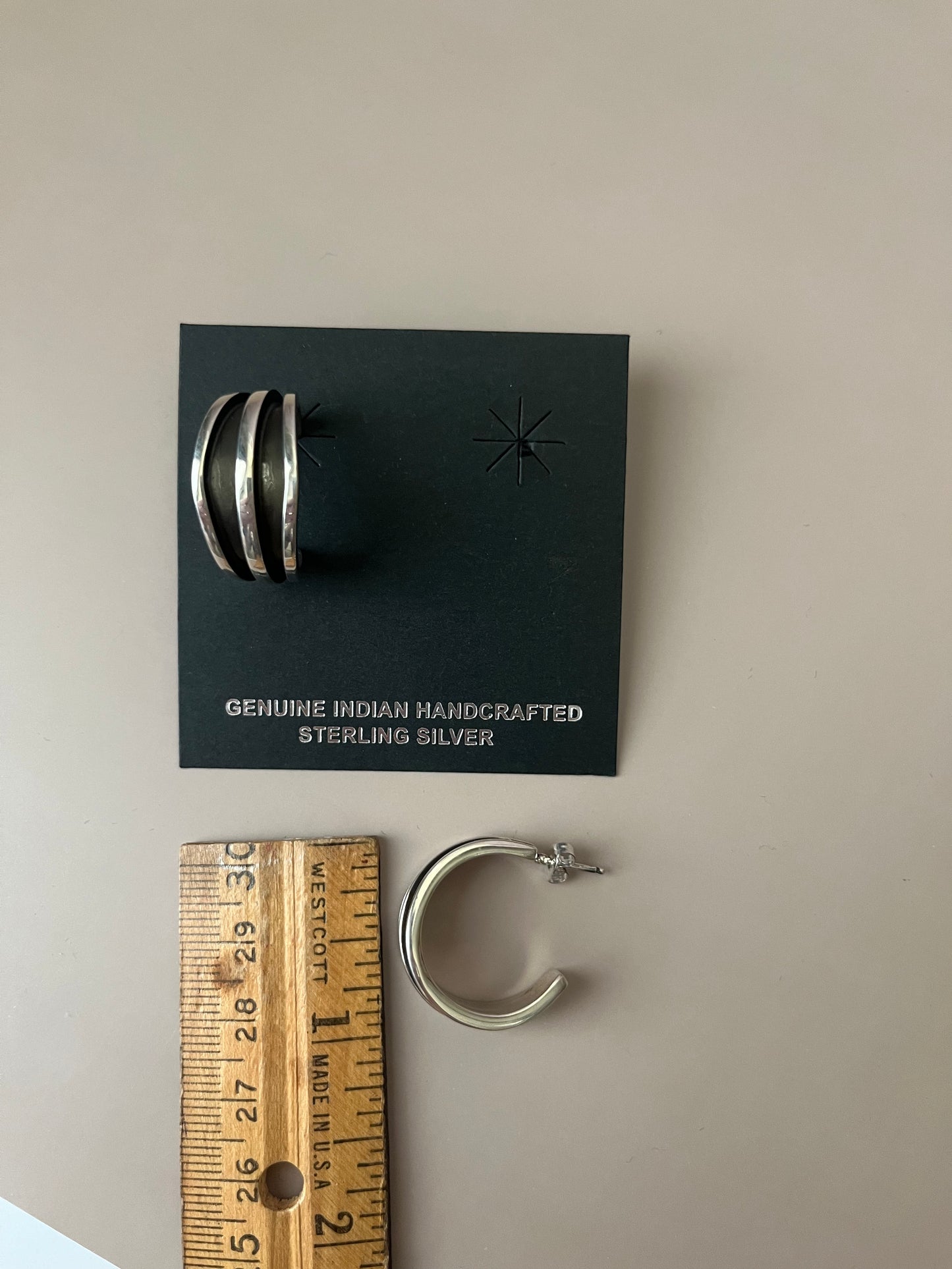 Hoop Earrings by Tom Hawk Stamped